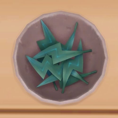A screenshot from The Sims 4 showing a bowl on a wooden floor. Inside the bowl is leaves shaped like lightning bolts