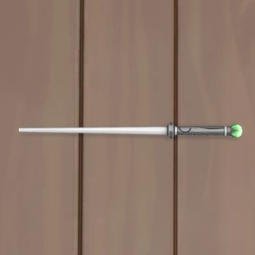 A screenshot from The Sims 4 showing a wooden floor with a marble wand with a green gem at the base of the handle