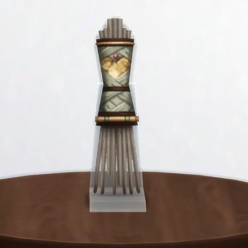 A screenshot from The Sims 4 showing a brown table with The Fingers of Sulani in light brown