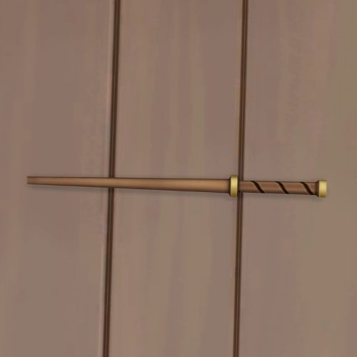 A screenshot from The Sims 4 showing a wooden floor with a solid wood wand with gold features