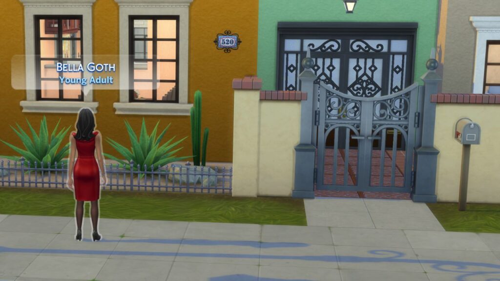 A screenshot from The Sims 4 showing Bella Goth outside a home after using the summon sim cheat