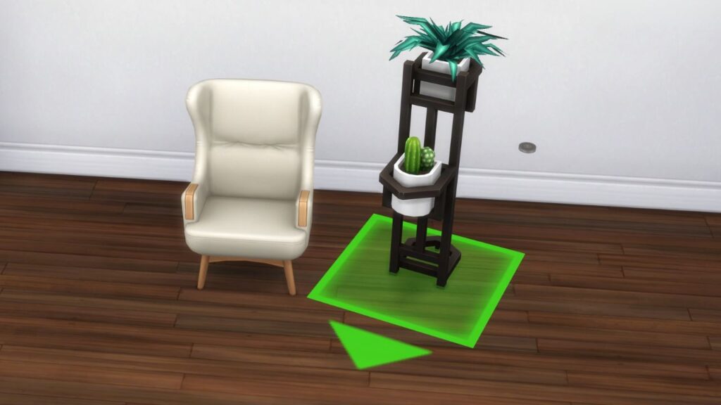 A screenshot from The Sims 4 showing how to free rotate items with move objects 
